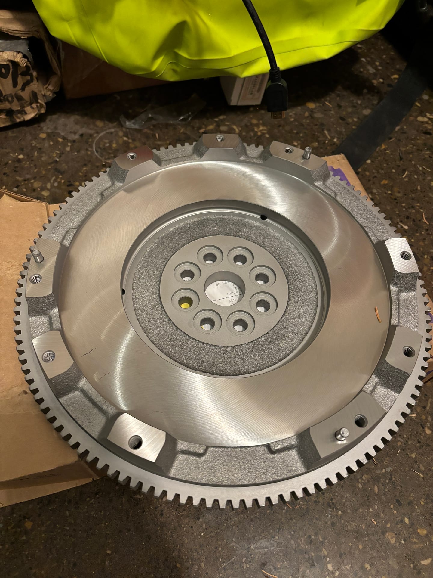 A resurfaced flywheel with a bright, evenly ground friction face